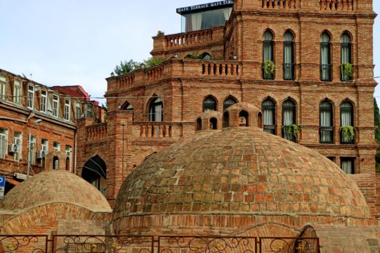 Close-up of red brickwork on traditional Sulfur Baths — centuries-old architecture in Tbilisi’s historic spa quarter