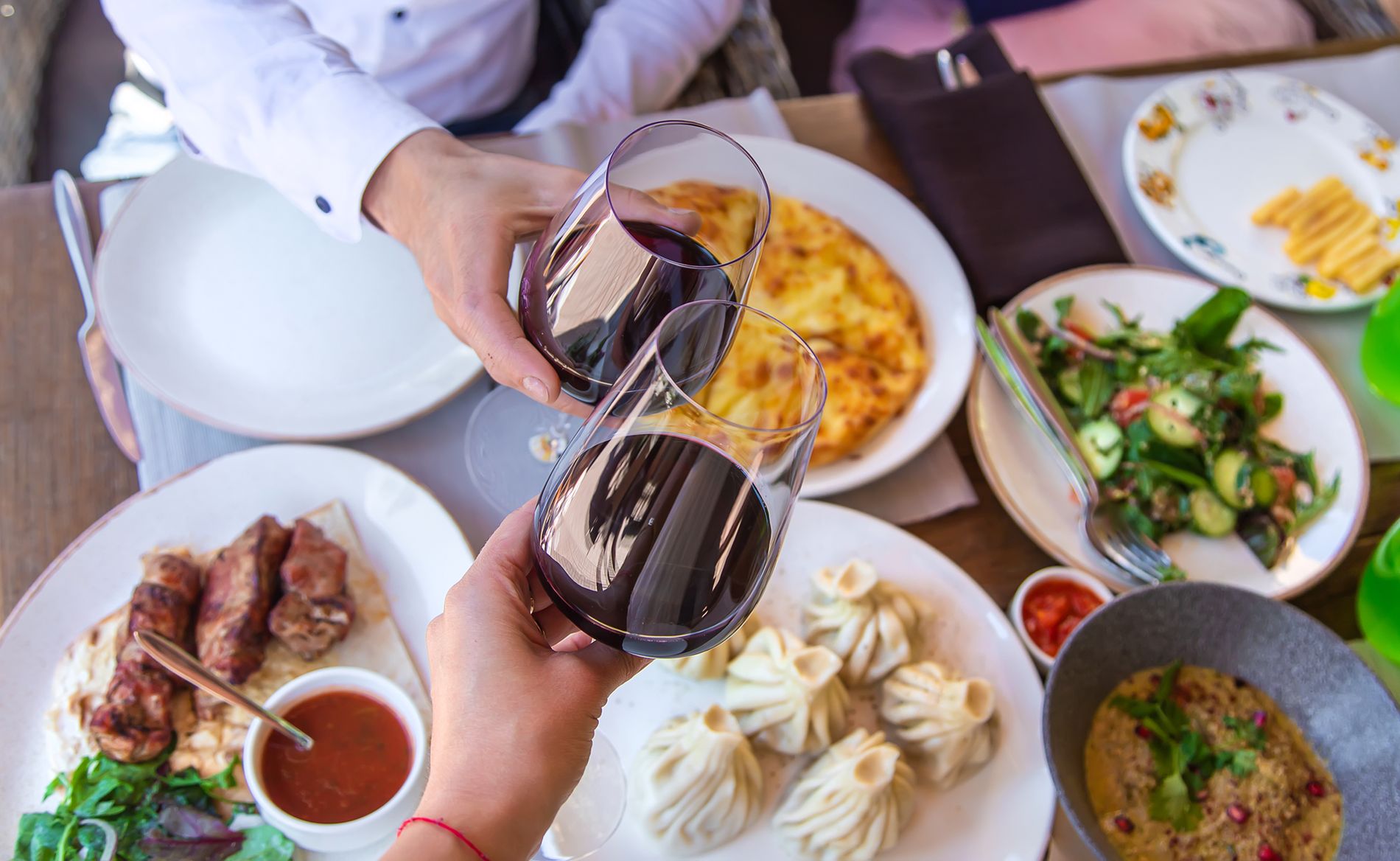 Georgian wine and traditional food — khachapuri, mtsvadi and local dishes served with wine from Kakheti or Kartli regions