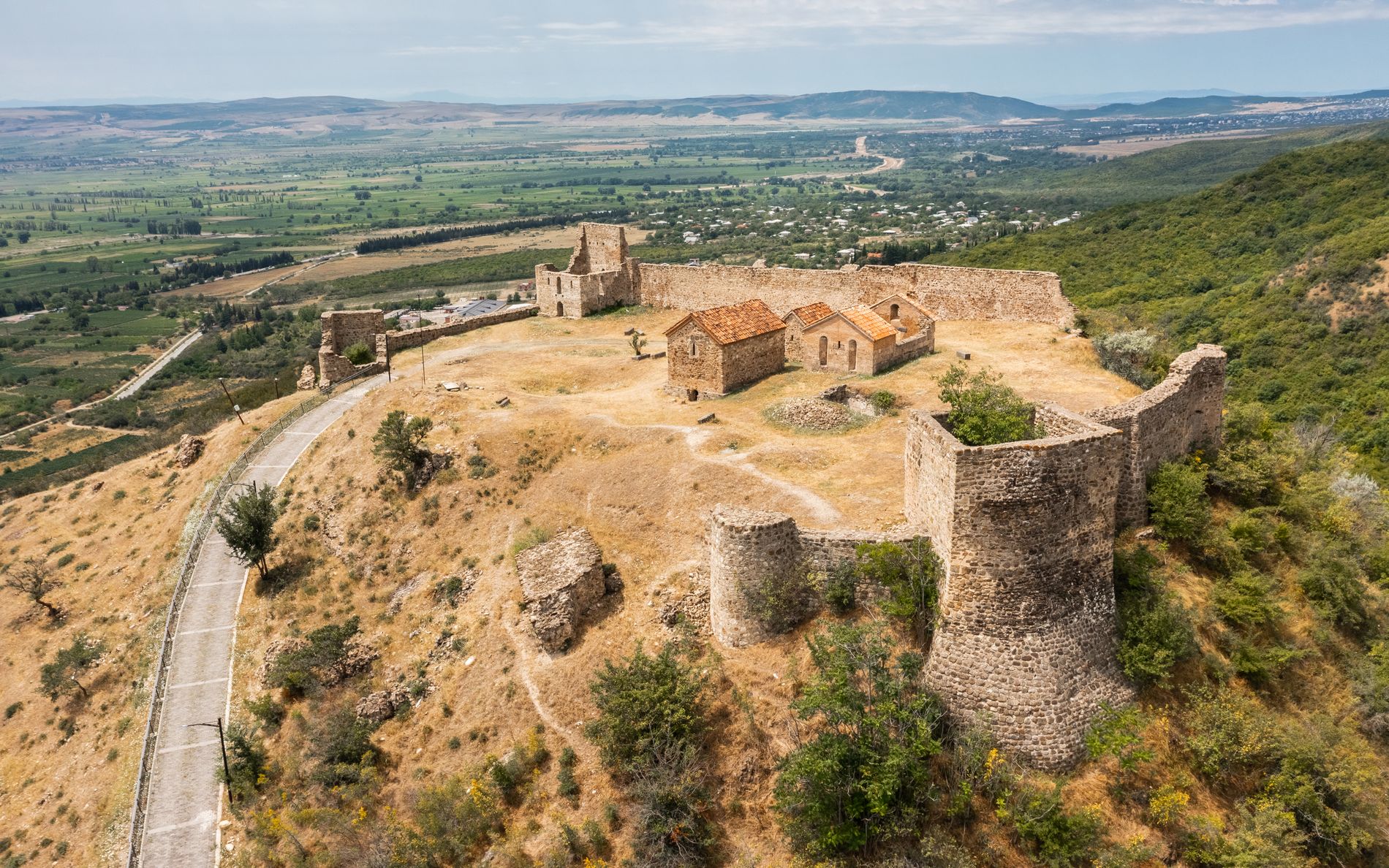 Ancient stone fortress ruins in Manavi village — medieval remains nestled in the Kakheti hills, known for wine and history