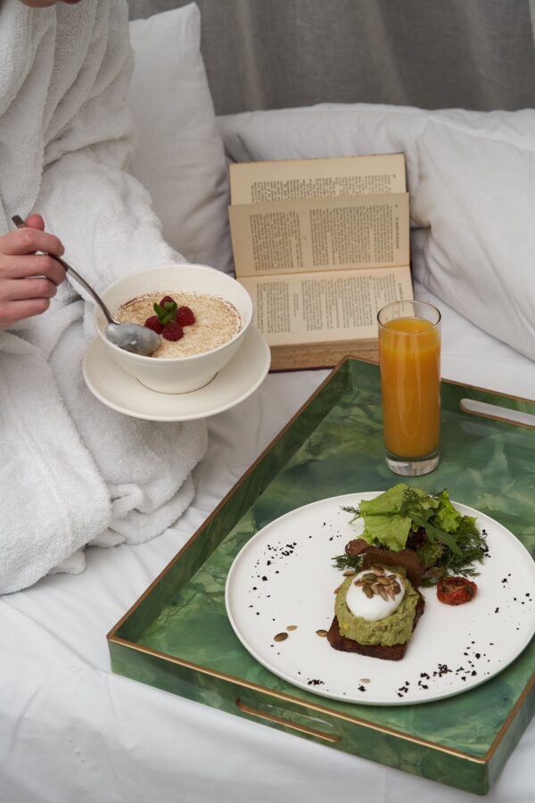 Morning breakfast served in bed — fresh pastries, fruit and coffee at Bellevue Boutique Hotel in Tbilisi